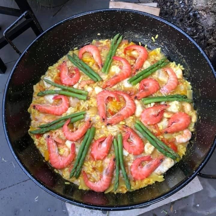 Delicious paella in wok pan