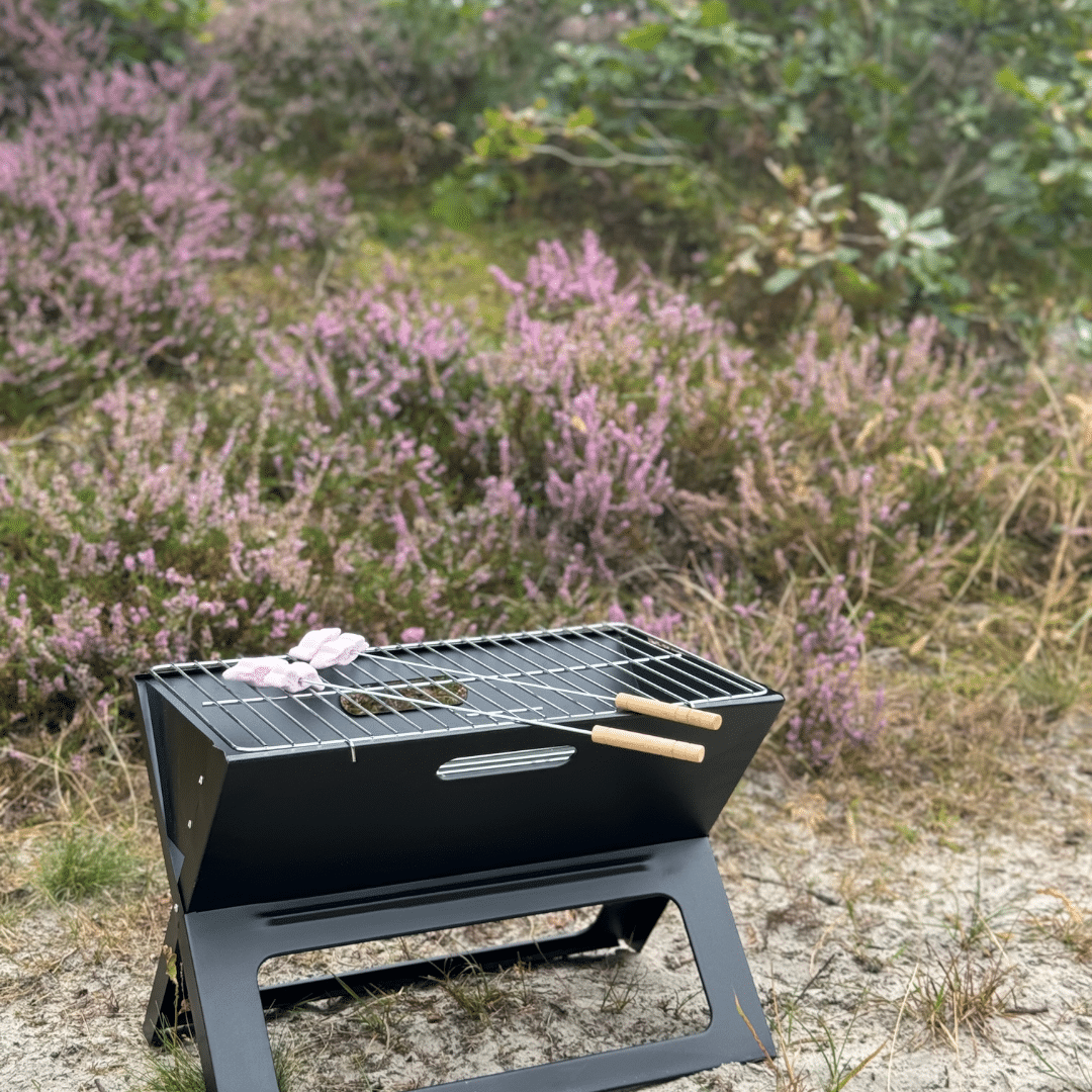 Opvouwbare BBQ Zwart met roze cadilac marshmallows autodrop
