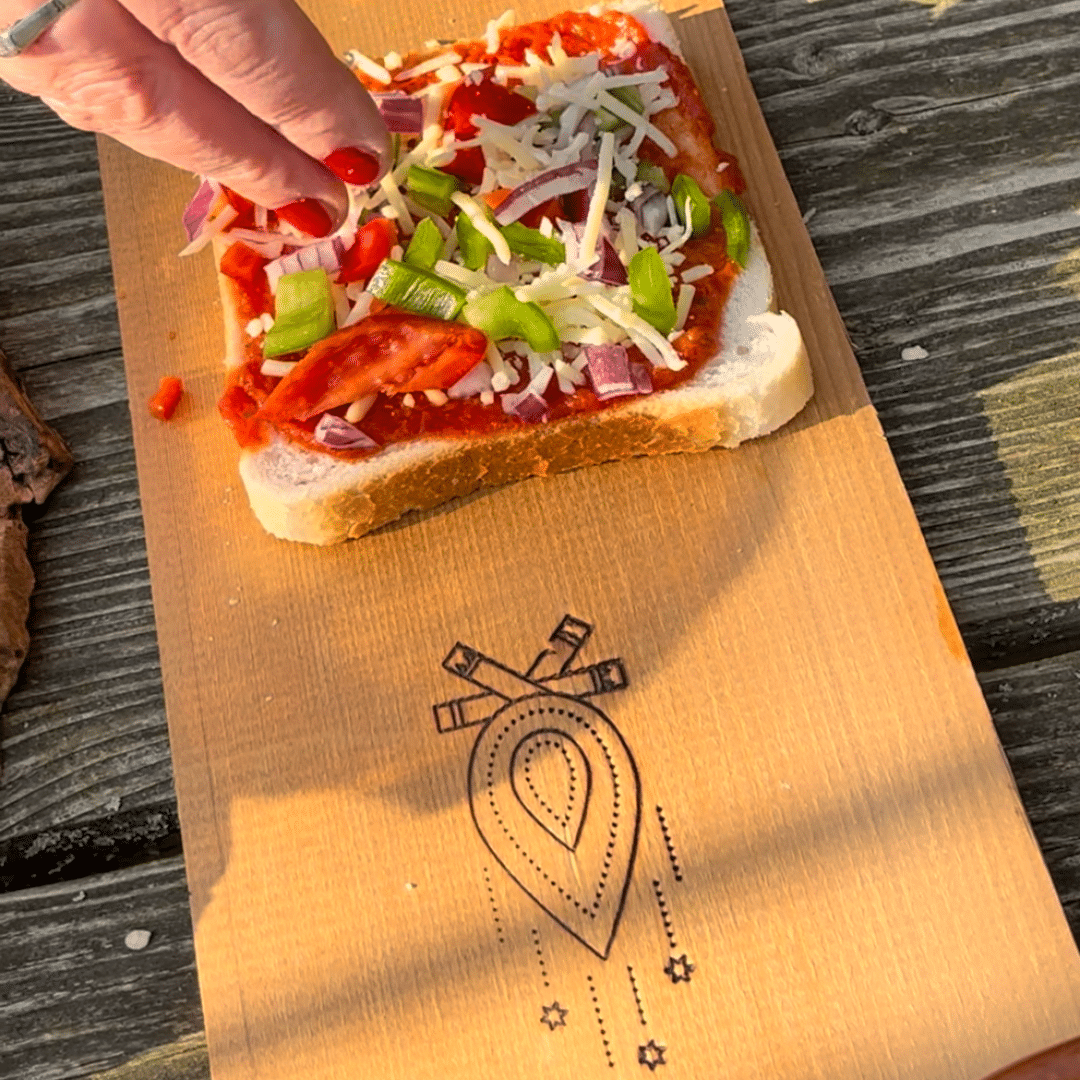 Beleg je eigen kampvuur pizza tosti